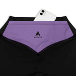 legging compression femme bi-color noir violet avec une poche intérieur