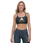 soutien gorge de sport noir NDA avec à l'avant la marque physique affûté de couleur blanc vue de face