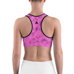soutien gorge de sport rose dégradé violet avec à l'arrière le logo de couleur noir vue de dos